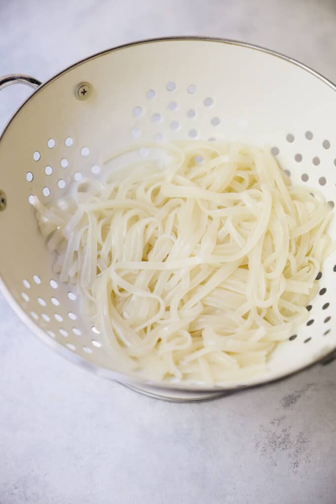 rice noodles in colander