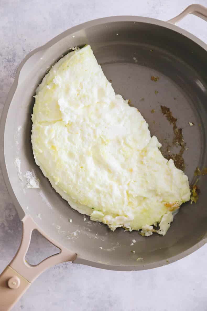 egg white omelet cooked in a non-stick pan.
