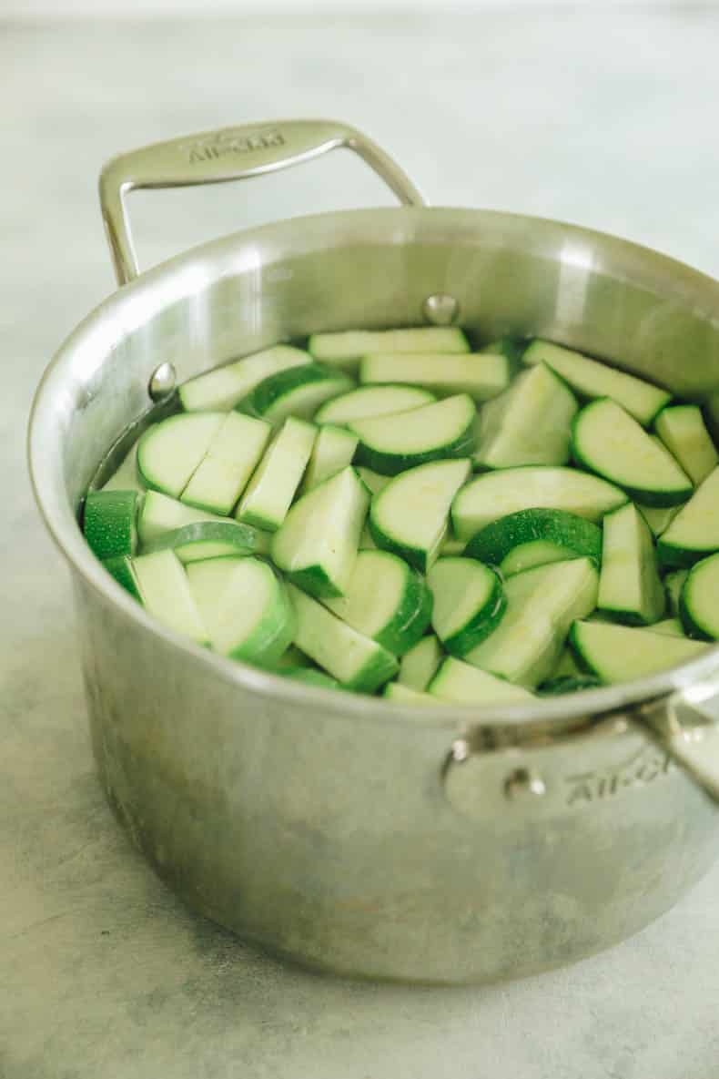 blanched zucchini in a pot of boiling water.