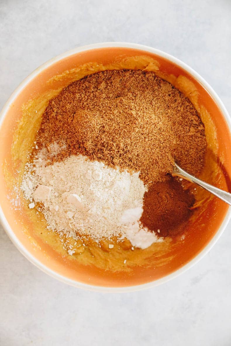 dry ingredients in a mixing bowl for monster cookie bars