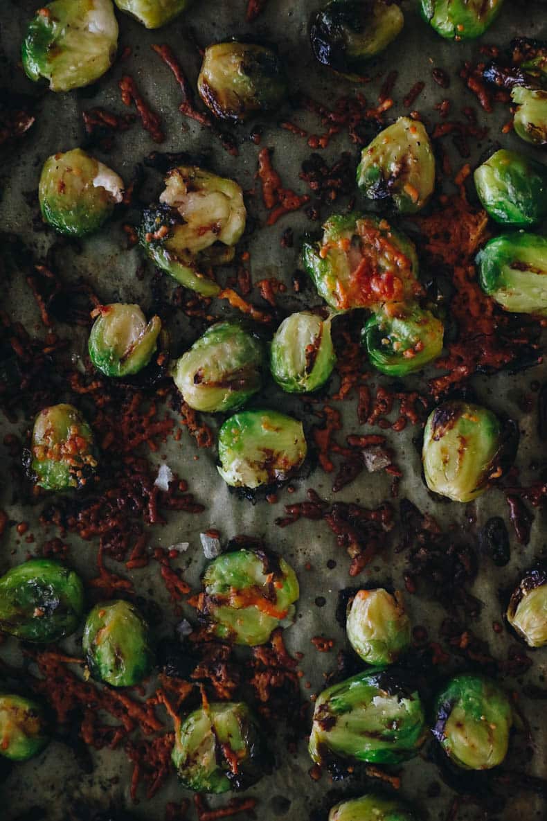 crispy smashed brussel sprouts on a sheet pan.