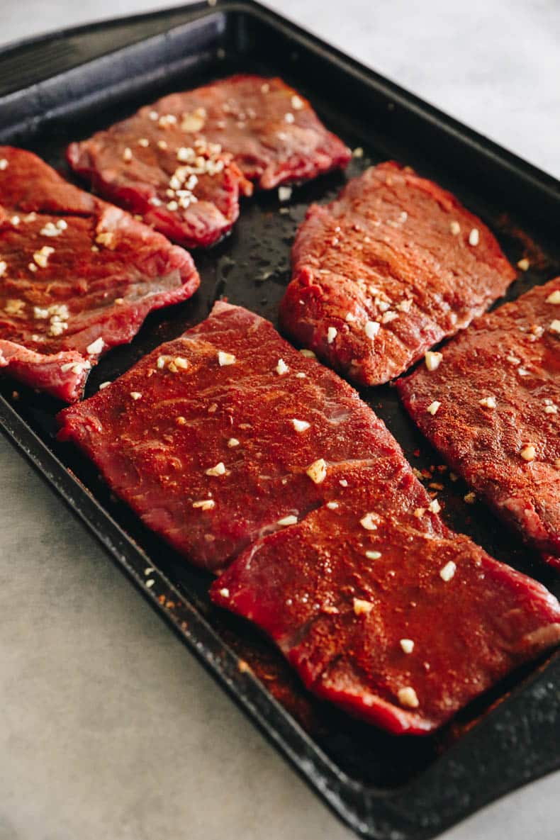 skirt steak marinated on a sheet pan