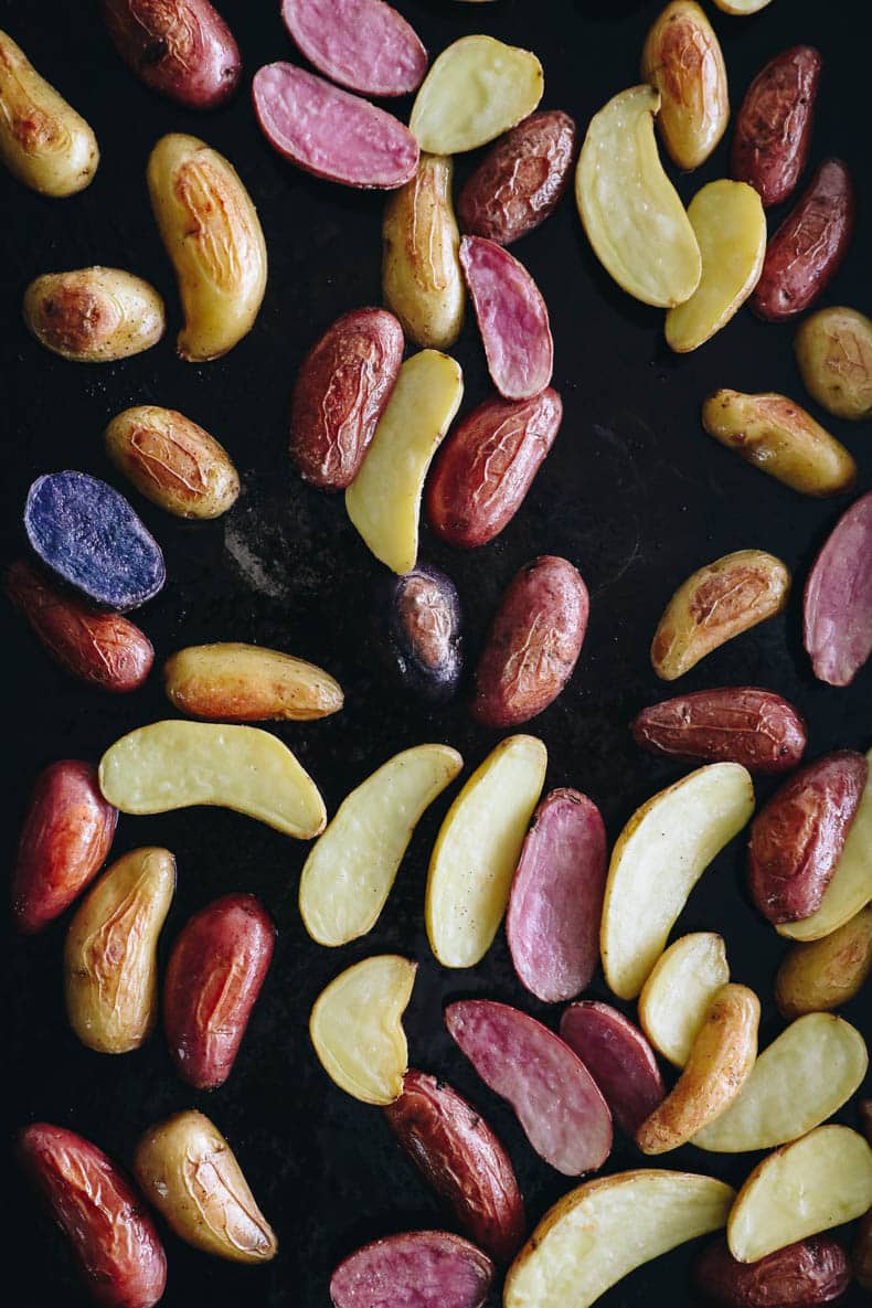 roasted fingerling potatoes on a sheet pan.