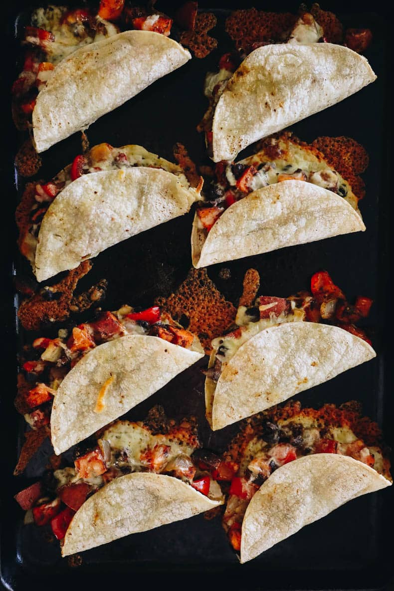 Baked tortillas on a sheet pan