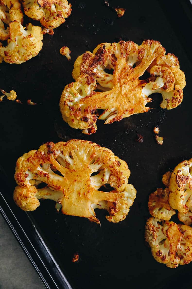 cauliflower steak on a sheet pan.