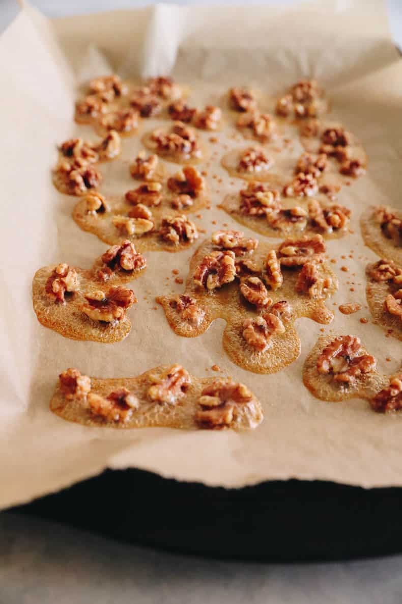 honey walnuts on a sheet pan.