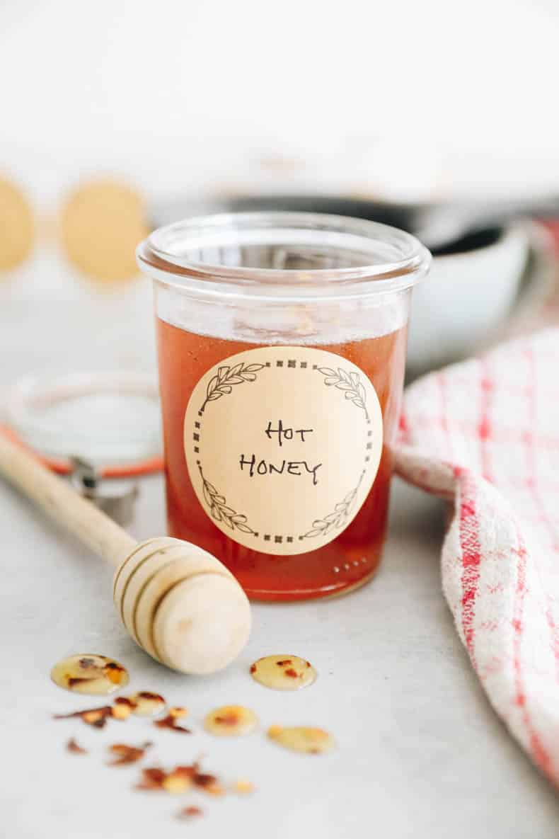 Hot honey in a small mason jar with a label