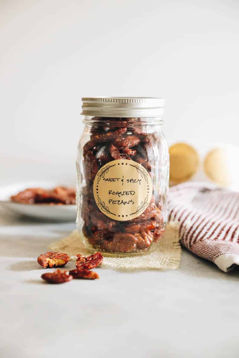 Sweet and Spicy Roasted Pecans come in a mason jar with a brown canning label.