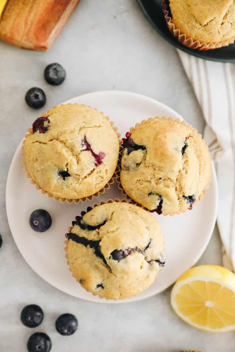 Overhead image of lemon blueberry muffins on a small plate.