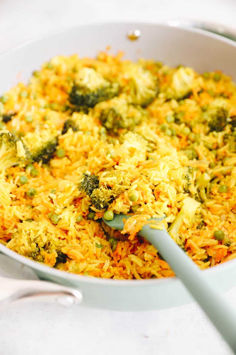 curried rice pilaf in a ceramic dish.