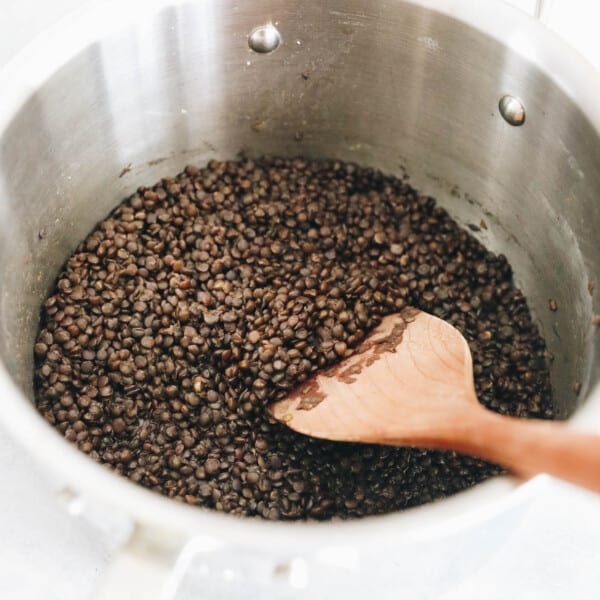 black beluga lentils cooked in a pot.