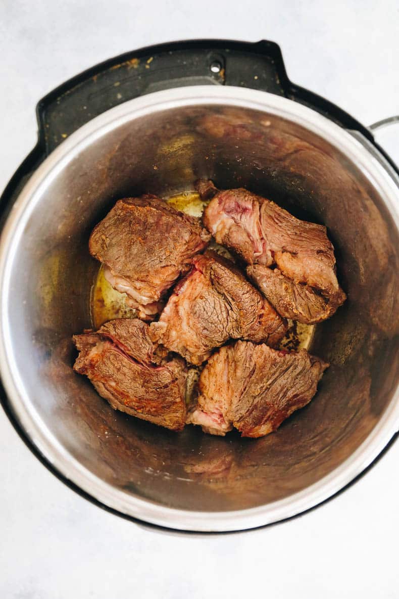 Seared chuck roast in an instant pot.